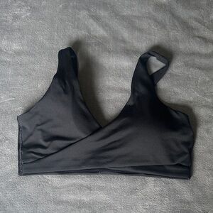 Nike black, front cross sports bra